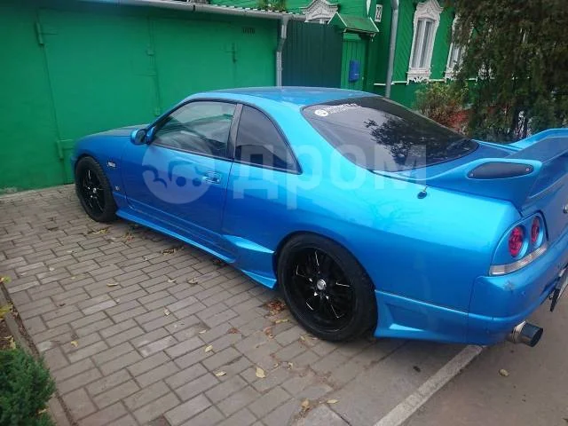 картинка Накладки на задний бамперBomex на Nissan Skyline R33, R33GTR магазин  StreetTuning 