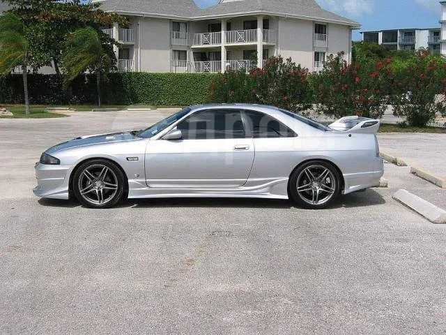картинка Накладки на задний бамперBomex на Nissan Skyline R33, R33GTR магазин  StreetTuning 