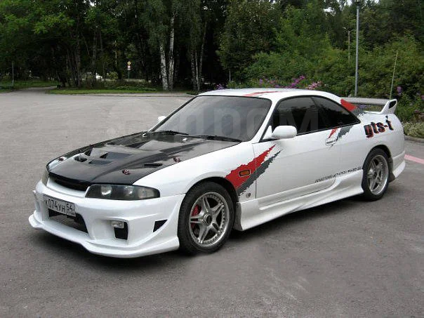 картинка Накладки на пороги для Nissan Skyline R33 купе магазин  StreetTuning 