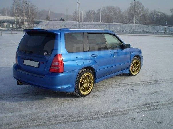 картинка Обвес (Клыки) на пороги и задний бампер для Subaru Forester SG магазин  StreetTuning 