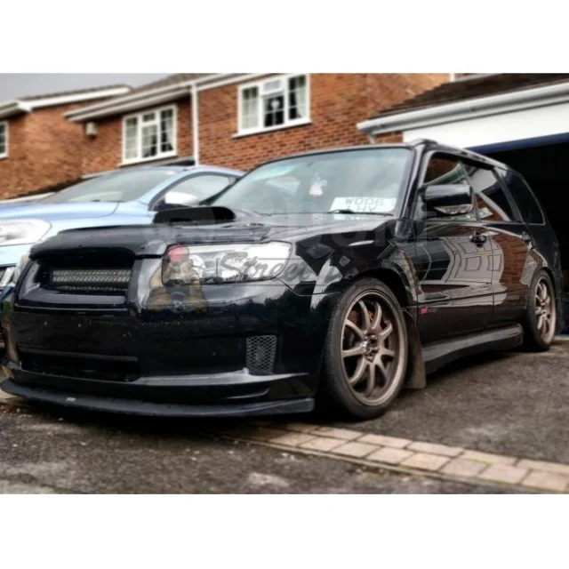 картинка Накладка (сплиттер) STI переднего бампера для Subaru Forester SG магазин  StreetTuning 