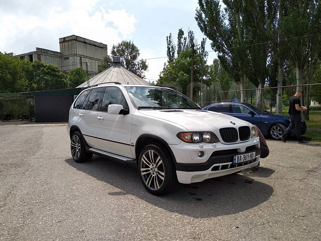 картинка Передняя юбка в стиле 4.8 для Bmw X5 E53 Рестайлинг магазин  StreetTuning 