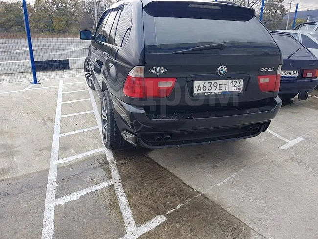 картинка Задняя юбка 4.8 для Bmw X5 E53 рестайлинг/до рестайлинг магазин  StreetTuning 
