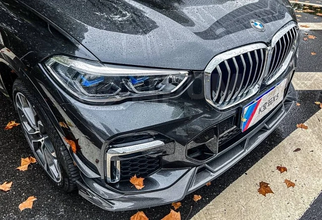 картинка Сплиттер (губа) на передний бампер для BMW X5 G05 M50i , карбон глянец магазин  StreetTuning 